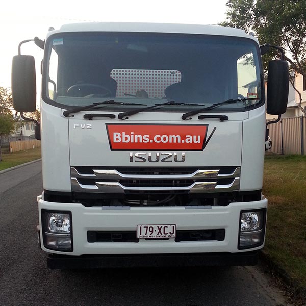 Deliverying a green waste skip